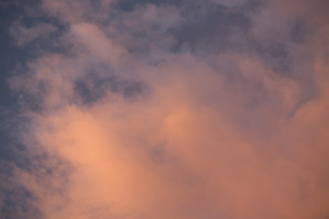 Beautiful sunset sky above clouds