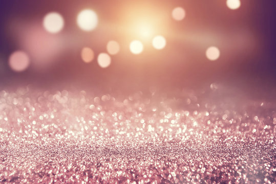 Rose gold glitter lights bokeh abstract background holiday. 