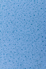 Fototapeta na wymiar close up of a blue ceramic tile with dark blue dot pattern