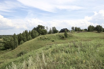 Landscape with a rural house.
