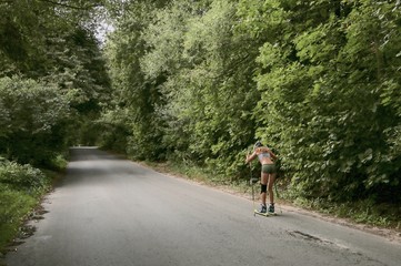 Asphalt road in the forest.
