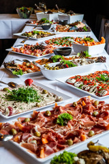 Party Brunch big Buffet table setting with Food Meat Vegetables - 219070576