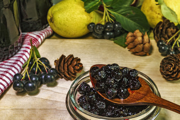 Black chokeberry jam and fruit