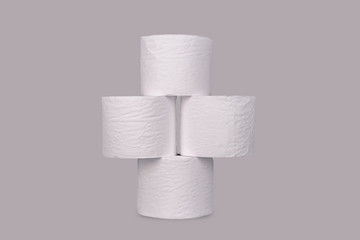 Toilet paper rolls on light grey color background.