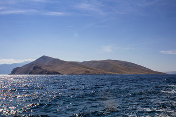 Small island with lighthouse, island Krk, Croatia