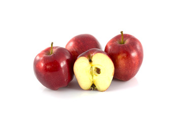 Fresh Red apple and half of red apple isolated on white