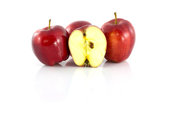 Fresh Red apple and half of red apple isolated on white background