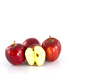 Fresh Red apple and half of red apple isolated on white
