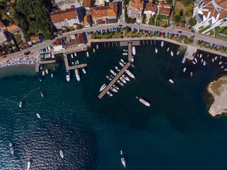 aerial view of yachts in city docks of montenegro