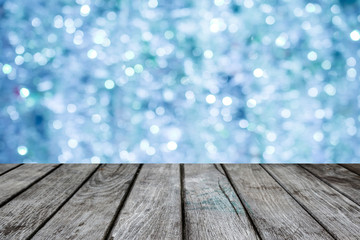 Blue bokeh with empty old top wooden table