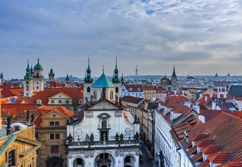 Fototapeta na wymiar Klementinum and Prague tile rooftops