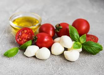 Italian food ingredients - mozzarella, basil, tomatoes