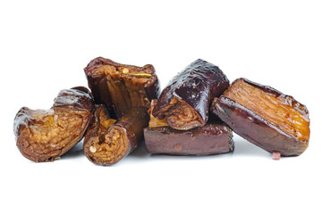 Grilled eggplant pieces isolated on white background