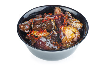 Ceramic bowl with roasted eggplants isolated on white background