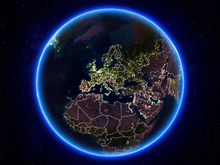 Naklejka premium Croatia on Earth from space at night