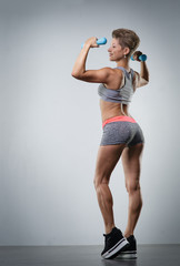 sports young woman doing warm-up