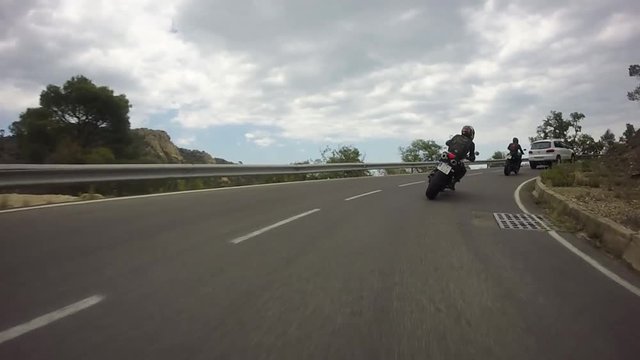 Motorcycles Overtaking in Mediterranean Road