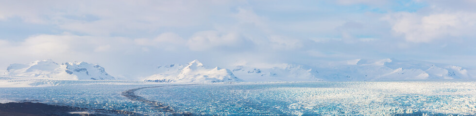 Glaciers and iceberg panorama in jokulsalon lagoon Iceland