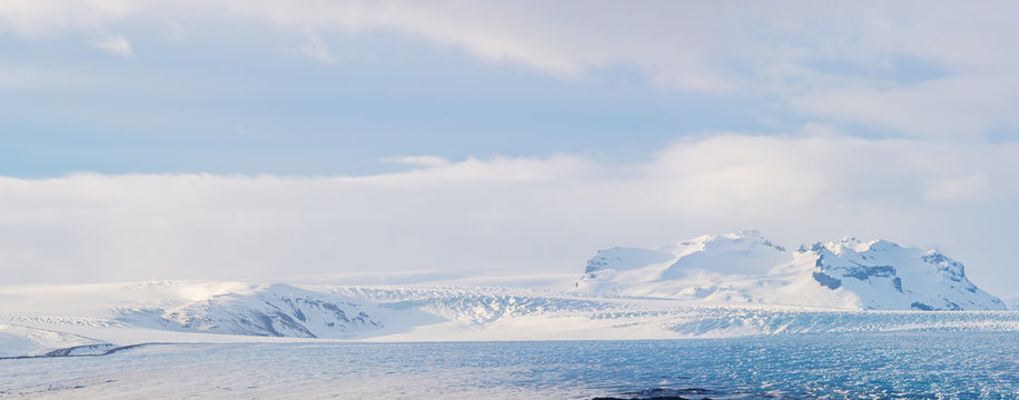Glaciers and iceberg panorama in jokulsalon lagoon Iceland
