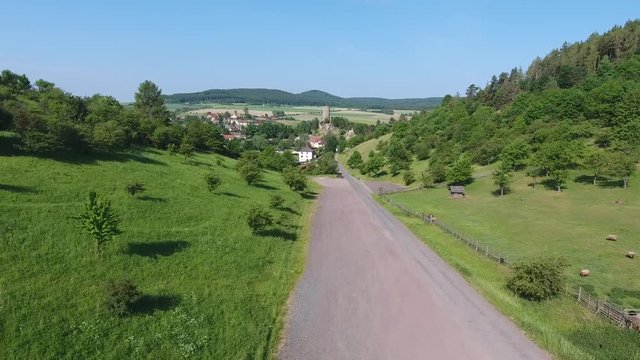 Aerial drone footage flight of Zebrak Castle ruins in beautiful landscape, Czech Republic, Europe, blue clear sky, sunny summer day