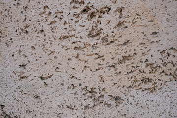 Natural beige stone texture. Textured background of a stone.