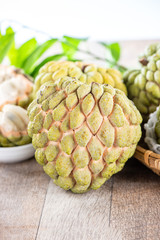 fresh sugar apple fruit(Custard Apple),sweetsop on wooden table background