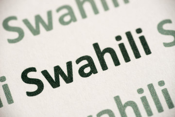 word Swahili language printed on paper macro