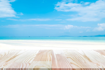 Perspective empty pine wooden table on top over blur background, can be used mock up for montage products display or design layout.