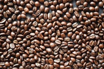 coffee beans on blackboard background, top view with copy space