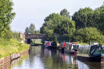 Fototapeta na wymiar Narrowboats on the Trent and Mersey canal in Cheshire UK
