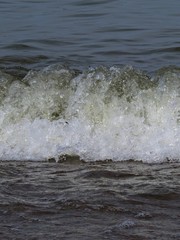 View at Clean Tranquil Water Surface Reflection with Small Waves