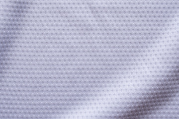 White fabric sport clothing football jersey with air mesh texture background