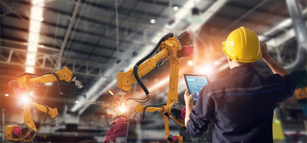 Poster Engineer using tablet check and control automation robot arms machine in intelligent factory industrial on monitoring system software. Welding robotics and digital manufacturing operation.