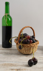 basket with blue vine. placed on a wooden board