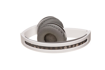 White wire headphones. Headphones isolated on white background