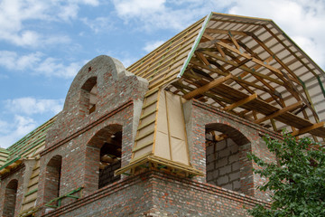 Restoration of the roof of an old building of the 1600s. Restoration and restoration of the roof of the old building. Restoration works of ancient architecture. Restoration of roofing structures.