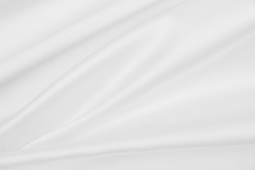 Obraz premium Smooth elegant white silk or satin luxury cloth texture as wedding background. Luxurious background design