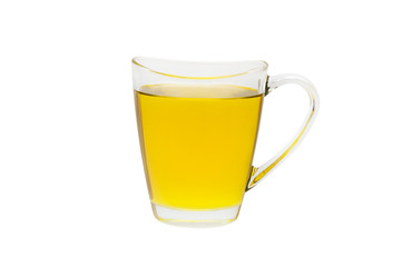 Glass cup of cooking oil isolated on white.