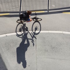 City biking in the morning sun