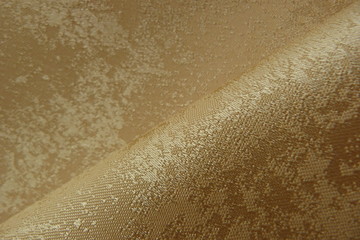 gold brocade fabric close-up natural linens creases padding oriental luxury shiny threads vintage...