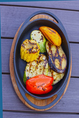 grilled vegetables on iron plate