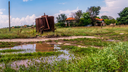 Fototapeta premium Reflection of abandoned old fuel tank- Tyulenovo village, Bulgaria