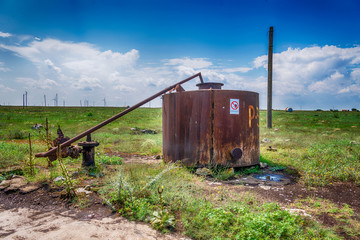 Fototapeta na wymiar Old abandoned crude oil tanks _Tyulenovo village, Bulgaria