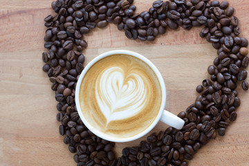 cup of coffee with beans