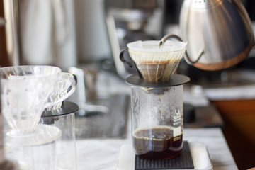 Brewing cup of coffee on the table