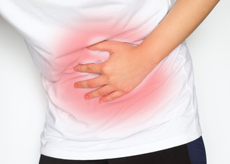 Man suffering from abdominal pain on white background.