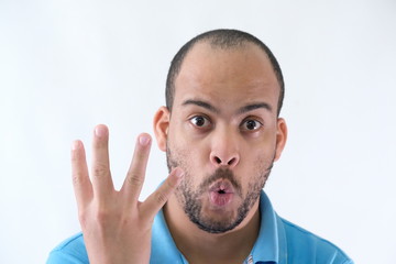 Man in blue t-shirt expressive face four