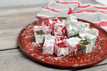 Turkish delight on a wooden table.