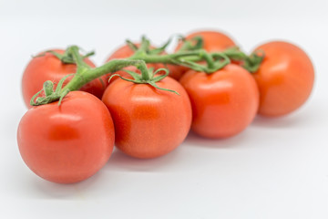 Ripe, red tomatoes, with a shallow depth of field