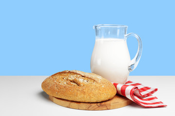 Bread and milk on the table